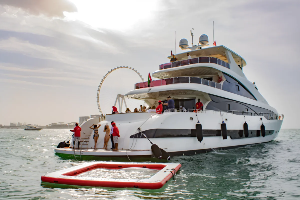 Sleek white 141ft tri-deck STARDOM superyacht cruising Dubai's waters